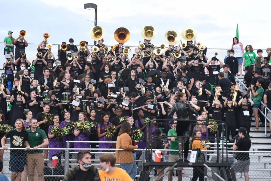 The Marching Band playing on the risers at a football game.
Photo By: Candid Color