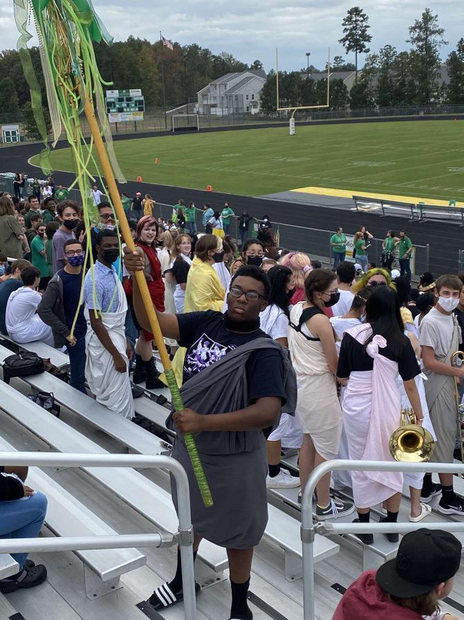 Norrell holds the spirit stick with the rest of the senior class at a pep rally.