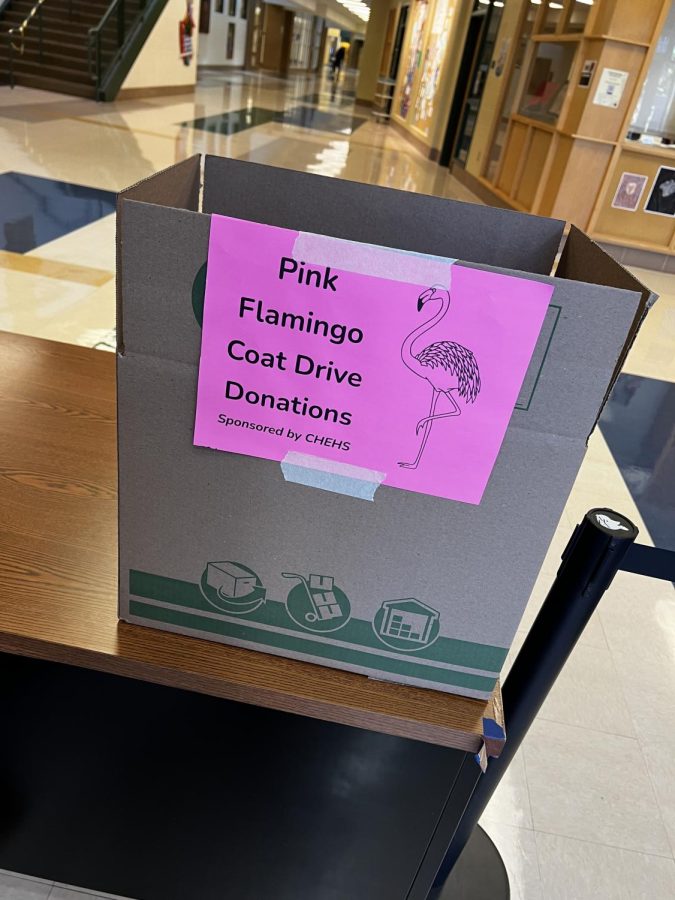 The Pink Flamingo Coat Drive donation bin outside of Door 1.