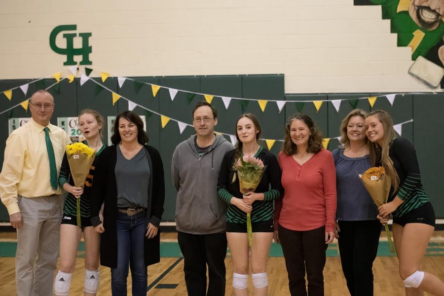 Three+girls+volleyball+seniors+were+recognized+before+an+October+game+against+Monacan.