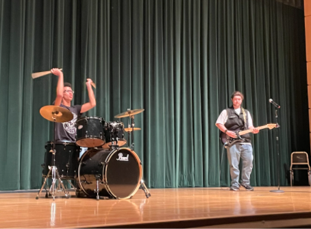 Viruet and Fraga perform as the band Face in the Crowd.