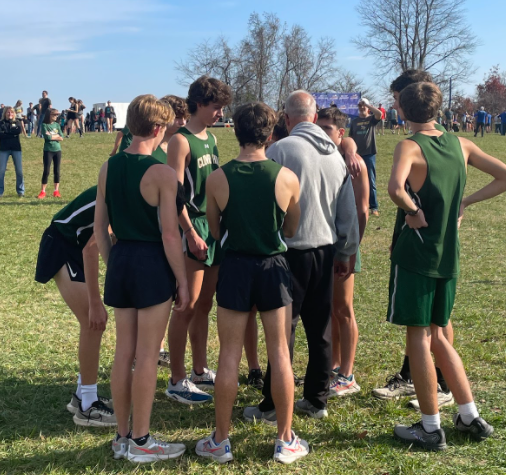 Coach James Wahrman addresses the team.