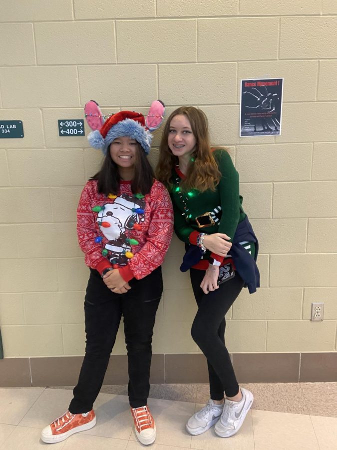Two students wear their most spirited outfits in order to Deck the Halls.