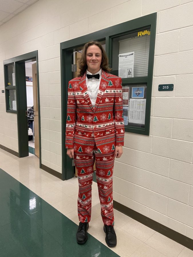 Junior Lance Aileo shows off his holiday themed tuxedo for Deck the Halls day.