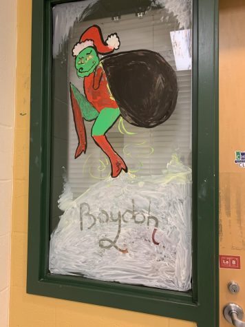 National Art Honors Society portrays holiday characters on windows and doors.