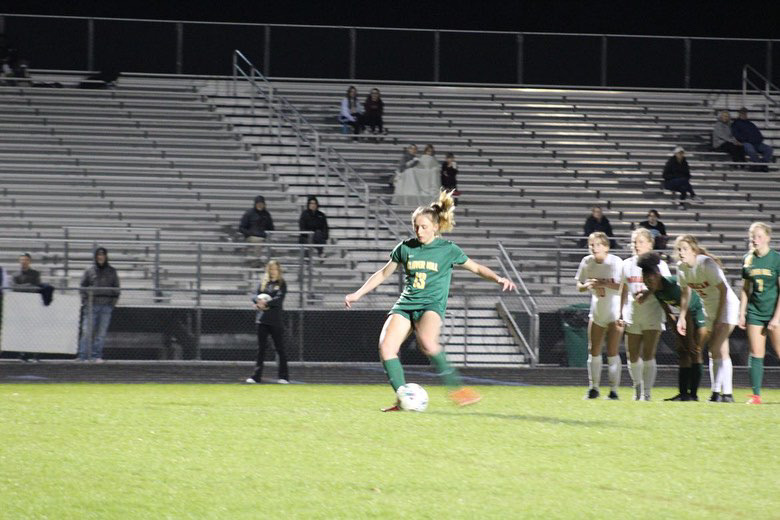 Senior Kayla Pulliam prepares to kick her penalty shot after a Monacan hand ball in the second half.