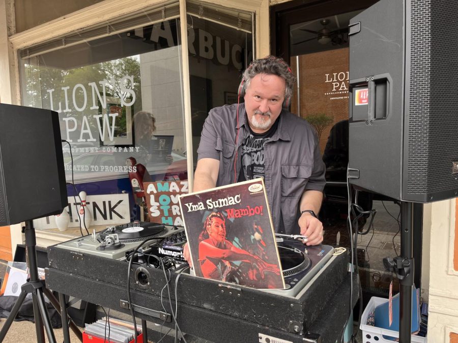 DJ Phil Ford spinning some wax outside of Deep Groove