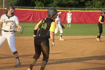 Freshman Kristyn Niles retreats back to third base after a pitch in the first inning.