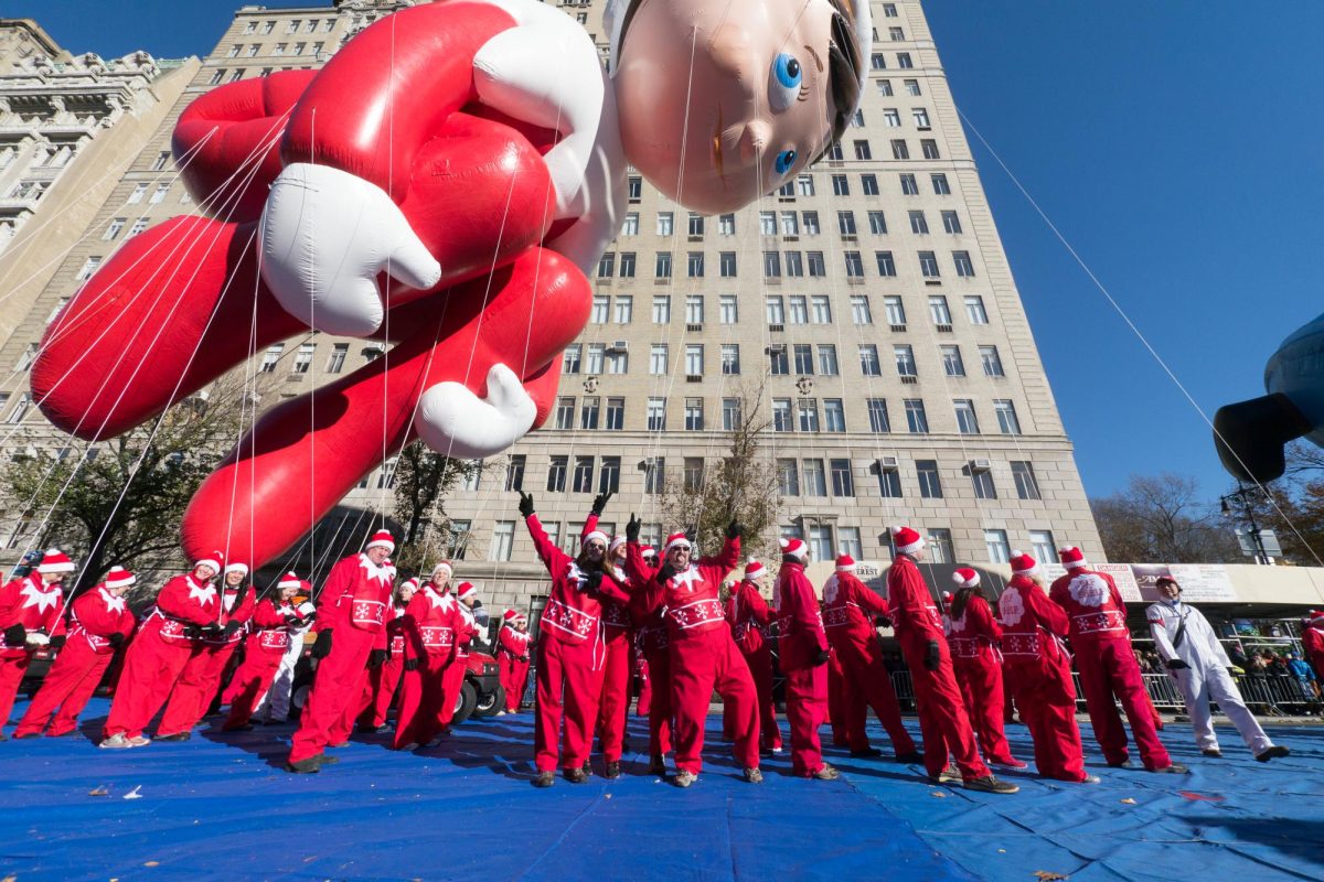 The Elf on the Shelf prepares to make his journey down the parade route.  