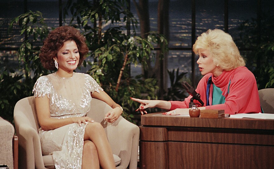 Joan Rivers interviewing one of her featured guest