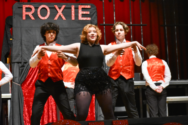 Eide dancing and singing in the spring musical Chicago