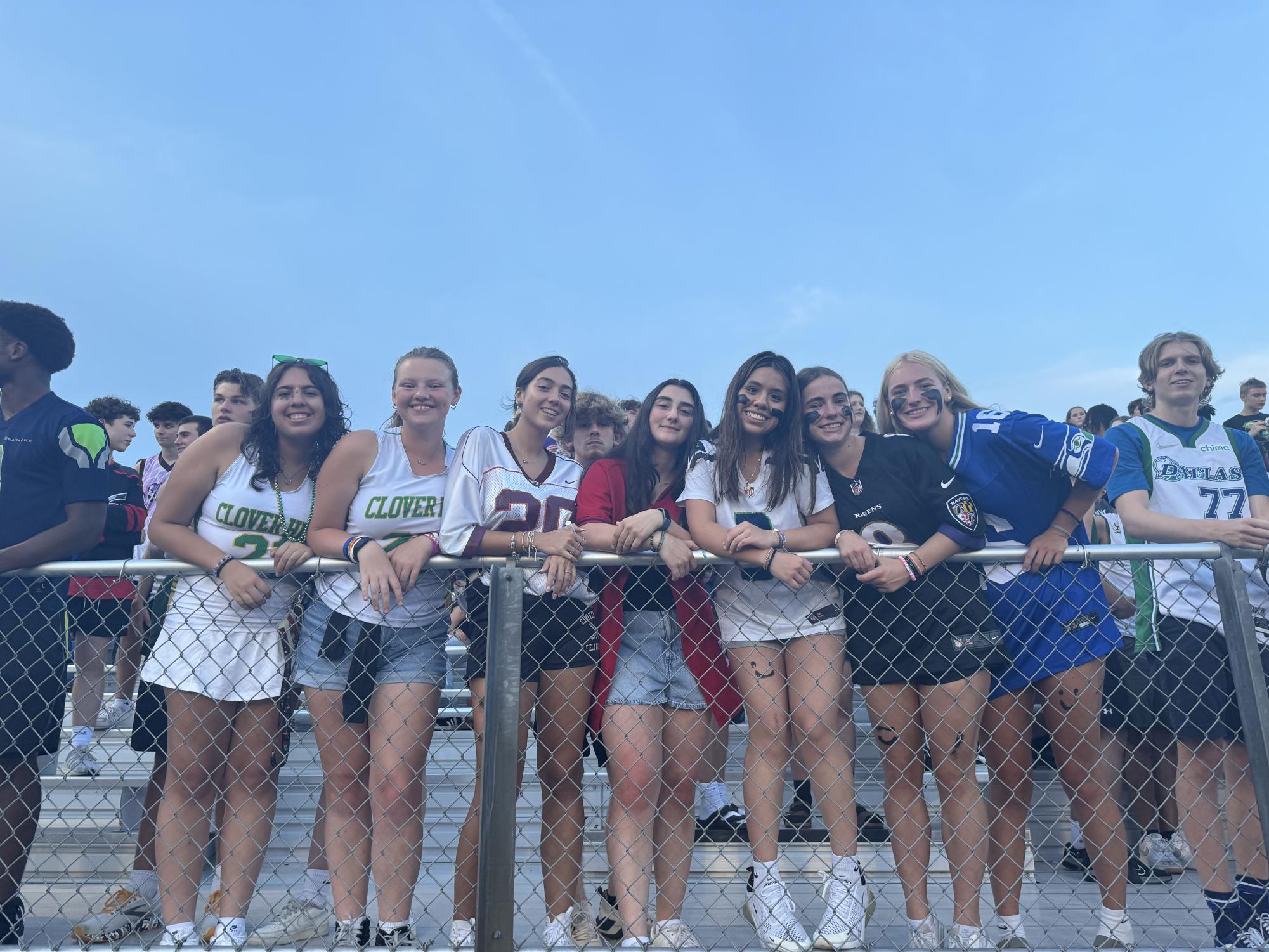 Students gathered in the student section for a picture