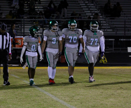 Varsity captains take the field before the game (left to right: Gavin Glasco, Logan Estep, Martín Pérez, Chase Nelson)

Credit: Michelle A. Perez Manzor