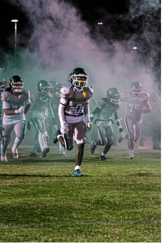 Gavin Glasco runs onto the field ready for the game