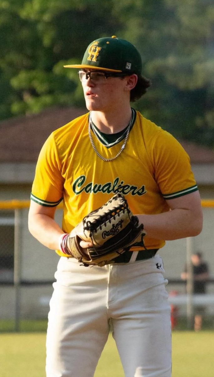 Outfielder Carson Hupp prepares to throw.