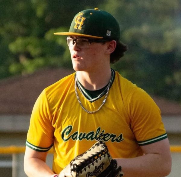 Outfielder Carson Hupp prepares to throw.