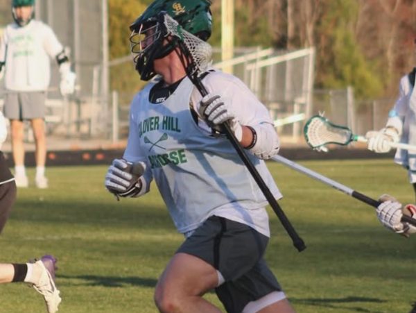 Michael Wilson on the field playing lacrosse