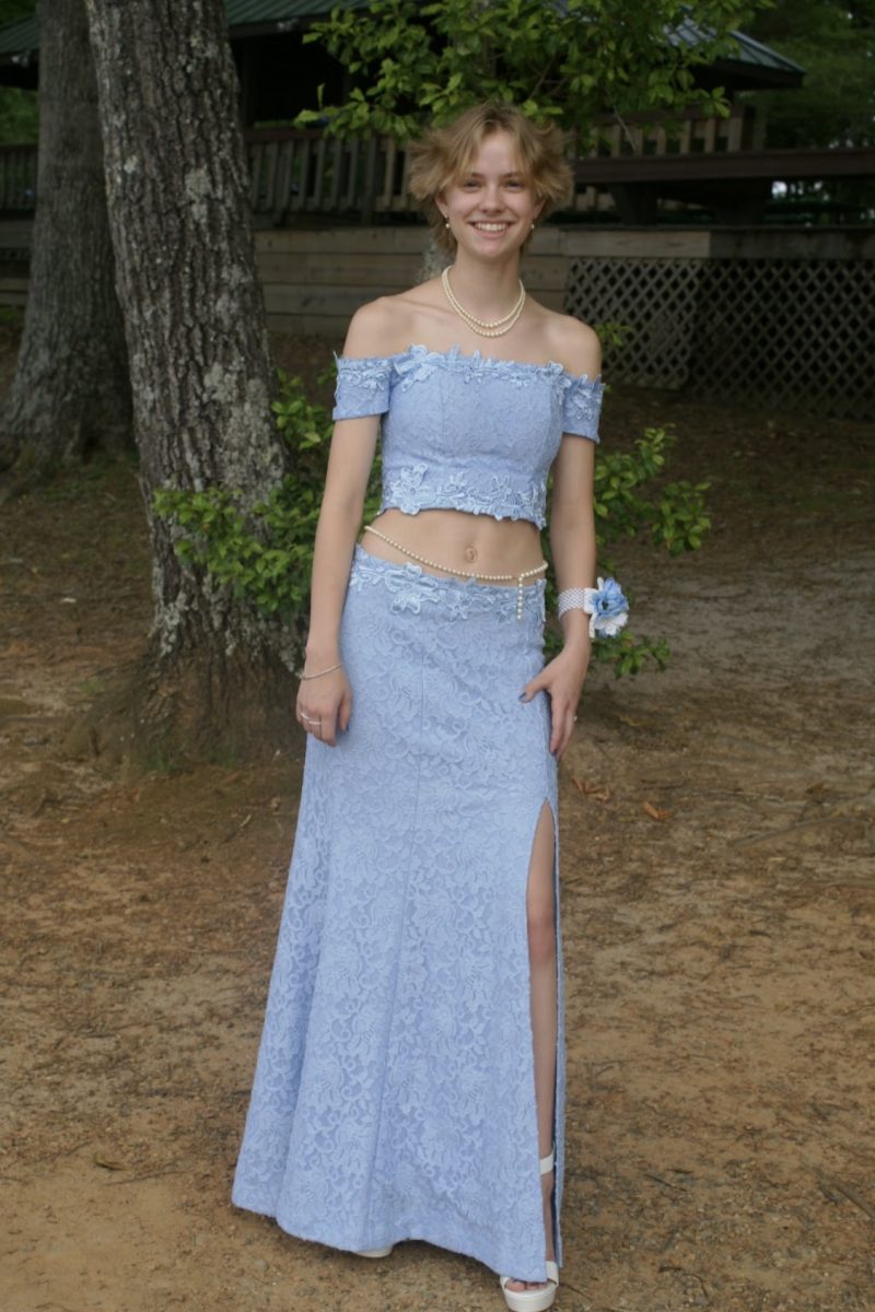 Purvis poses for a full body shot for their Senior Prom