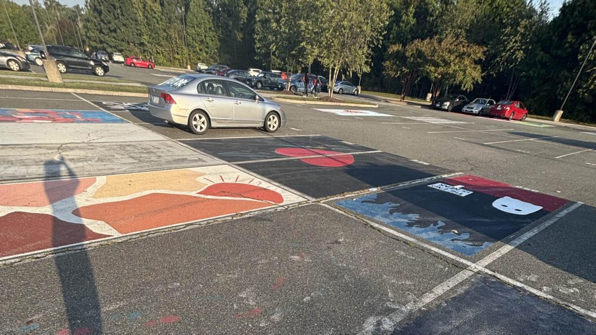 Parking spaces in the senior parking lot where some are painted from previous years, and some are let blank.