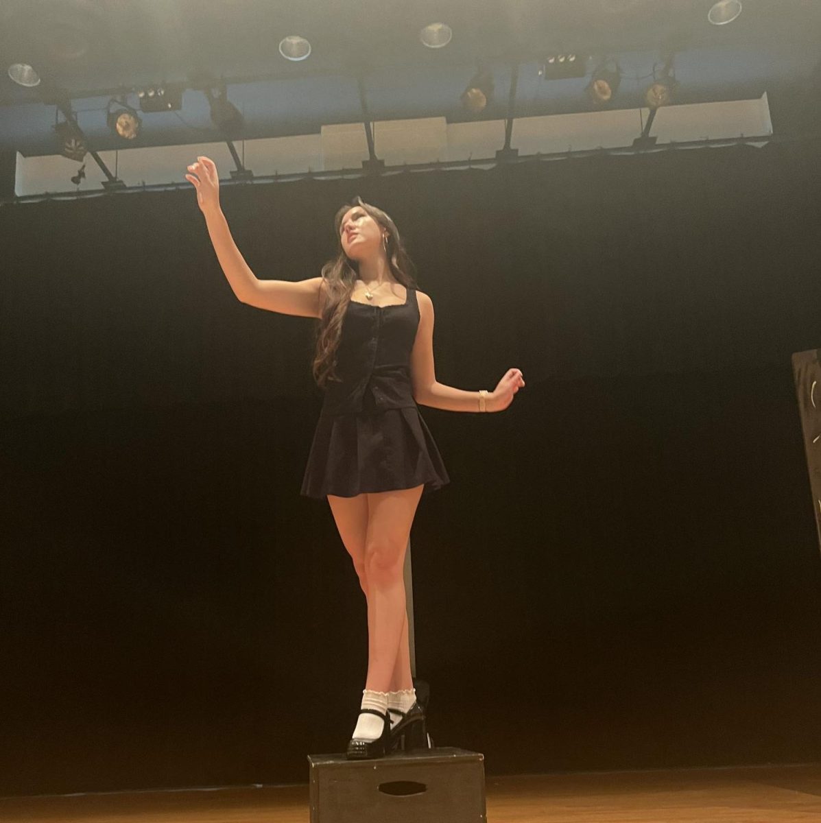 Lily Schofield poses on the forum stage