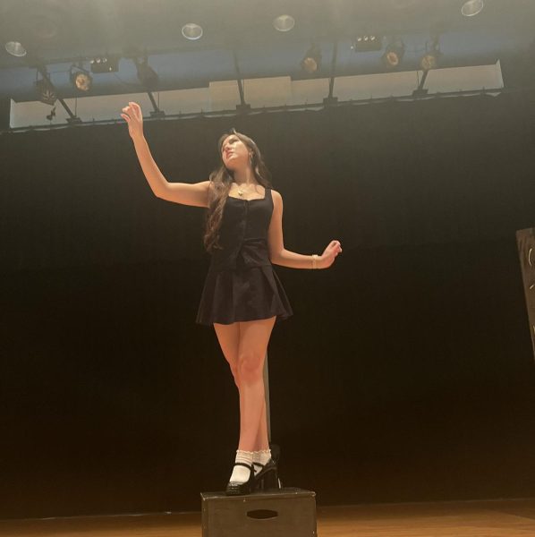 Lily Schofield poses on the forum stage