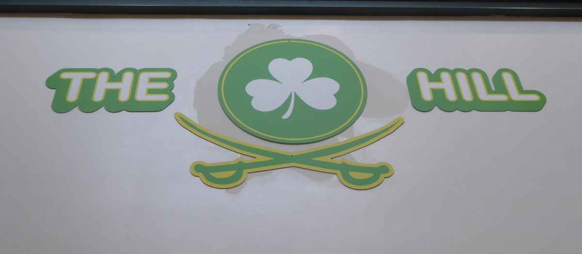 New design labeled "The Hill" with the old cavalier logo peeking through