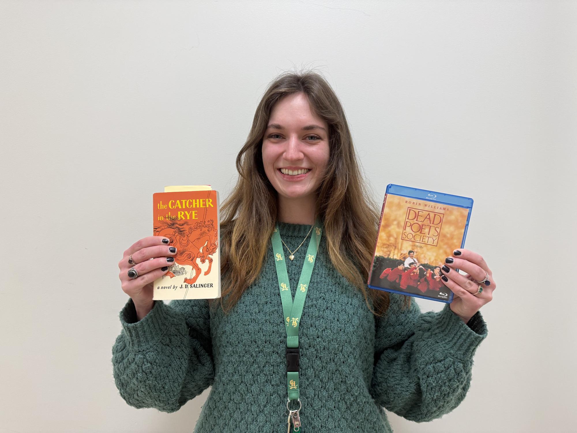 Forward holding up novel "Catcher in the Rye" and the film "Dead Poets Society"