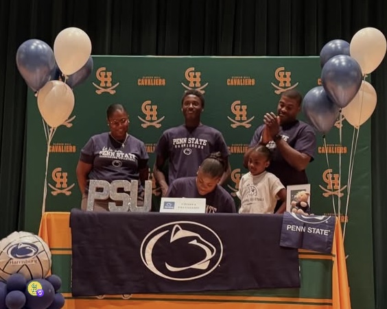 Chasya Deliazard, with her family, commiting to Pennsylvania State University at Harrisonburg–Capital College for volleyball. 